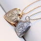 Gold- and silver-tone heart locket pendant necklace with paw-print photo frames