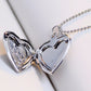 Silver-tone heart locket pendant necklace with open hinged photo frame