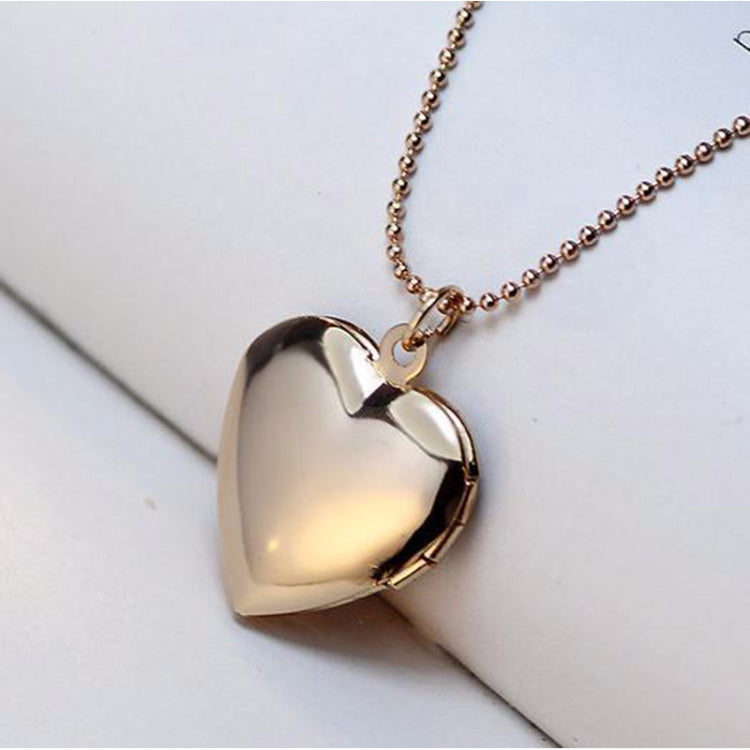 Gold-tone heart locket pendant necklace with smooth hinged photo frame front