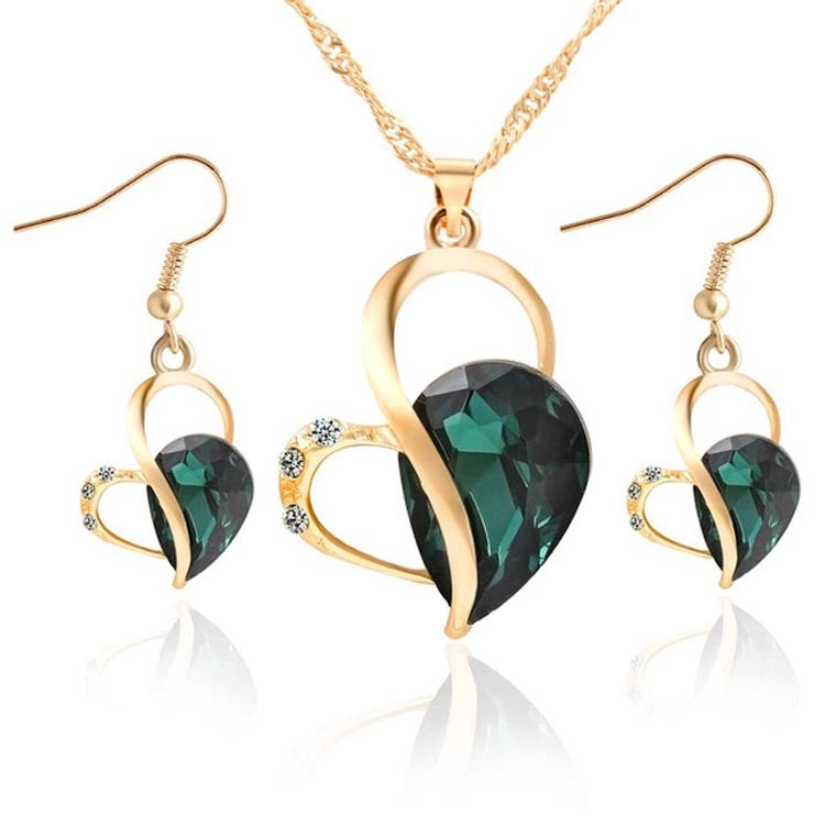 Gold-tone heart crystal pendant necklace set with matching drop earrings, green gemstone