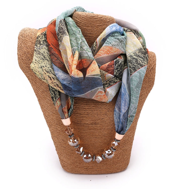 Chiffon scarf with multicolor geometric floral pattern and beaded necklace