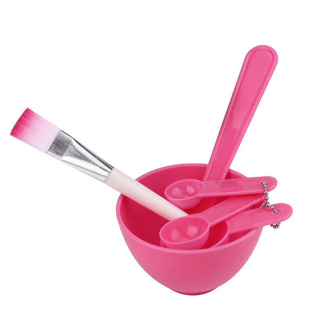 DIY facial mask mixing bowl set with pink bowl and brush, spoon, and stick tools