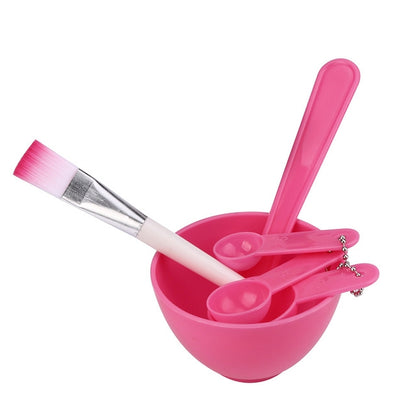 DIY facial mask mixing bowl set with pink bowl and brush, spoon, and stick tools