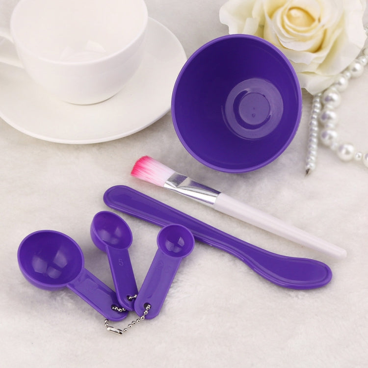 DIY facial mask mixing bowl set with purple bowl and brush, spoon, and stick tools
