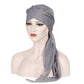 Gray chiffon turban cap with front cross and long draped tail