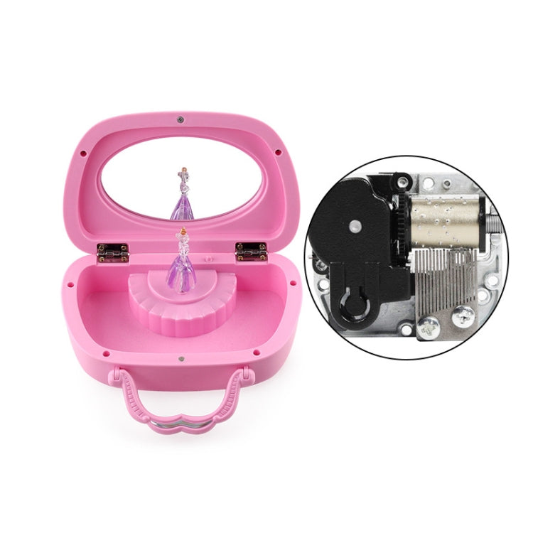 Pink open music jewelry box with ballerina figurine and side metal clasps