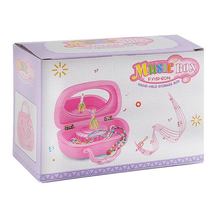 Music jewelry box gift package showing handheld pink box and ballerina illustration