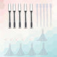 Mascara tube refill set with black wand inserts, clear pipettes, and funnels