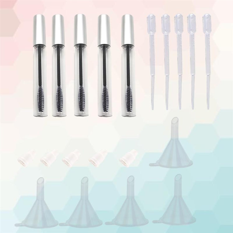 Mascara tube refill set with black wand inserts, clear pipettes, and funnels