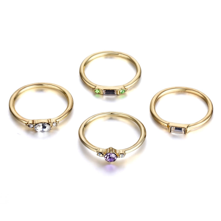 Gold-tone ring set of 4 with multicolor oval and baguette crystal stones, open bands