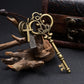 Antique-style crown key pendant with heart charm, ribbon cord, and hanging keys
