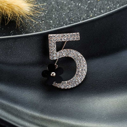Rhinestone number 5 brooch with black flower center, rose-gold tone metal pin