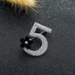 Rhinestone number 5 brooch with black flower detail, silver-tone metal pin