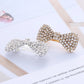 Crystal rhinestone bow hairpins set with arched silver and gold bows