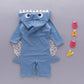 Light blue hooded shark swim romper with dorsal-fin hood and side fin details