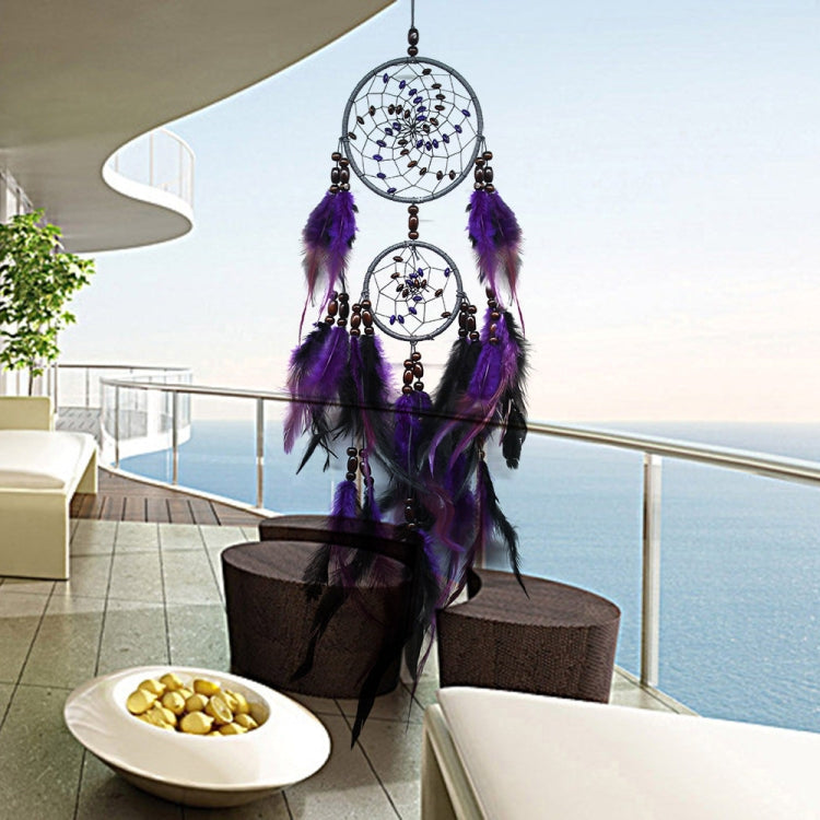 Purple feather dream catcher wall hanging with two beaded hoops and dangling feathers