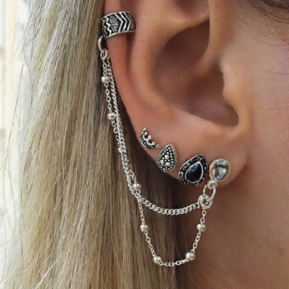 Silver-tone ear cuff chain earrings with oval, teardrop, and round charm links