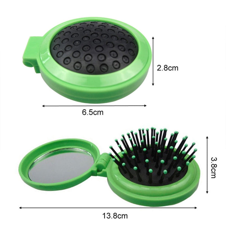 Green compact folding hair brush with round cushion and short pins