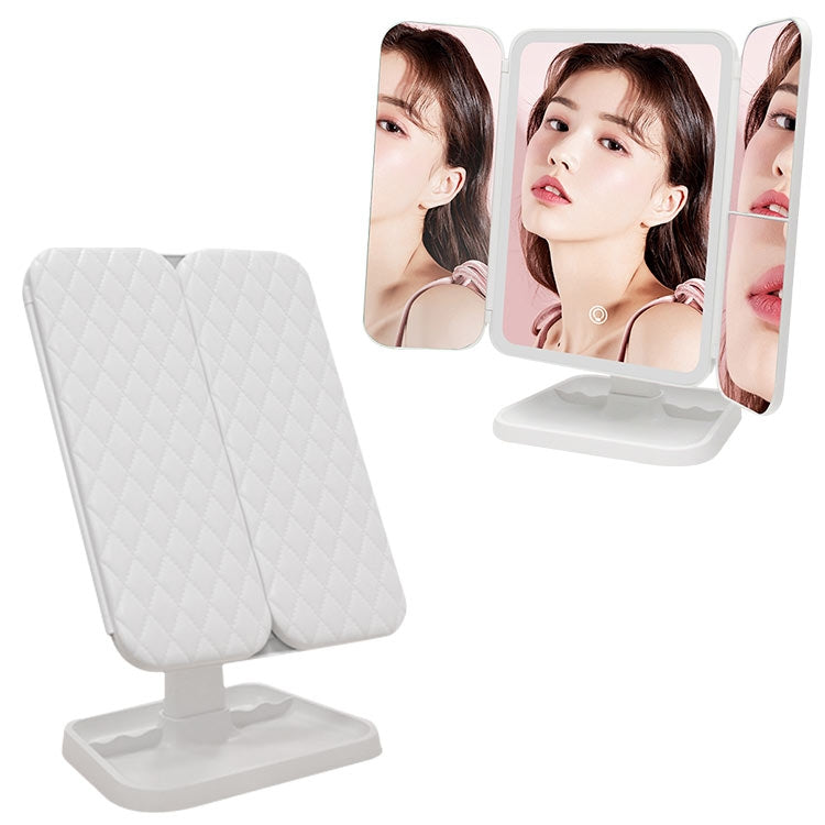 White three-fold LED makeup mirror opened on tabletop stand with side panels