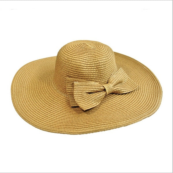 Girls wide-brim straw sun hat with tied fabric bow, mustard yellow.