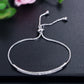 Adjustable silver zircon single-row curved bracelet with tied ends