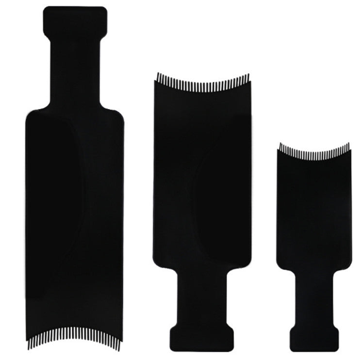 Set of black hair dye applicator brushes with different comb-tooth lengths