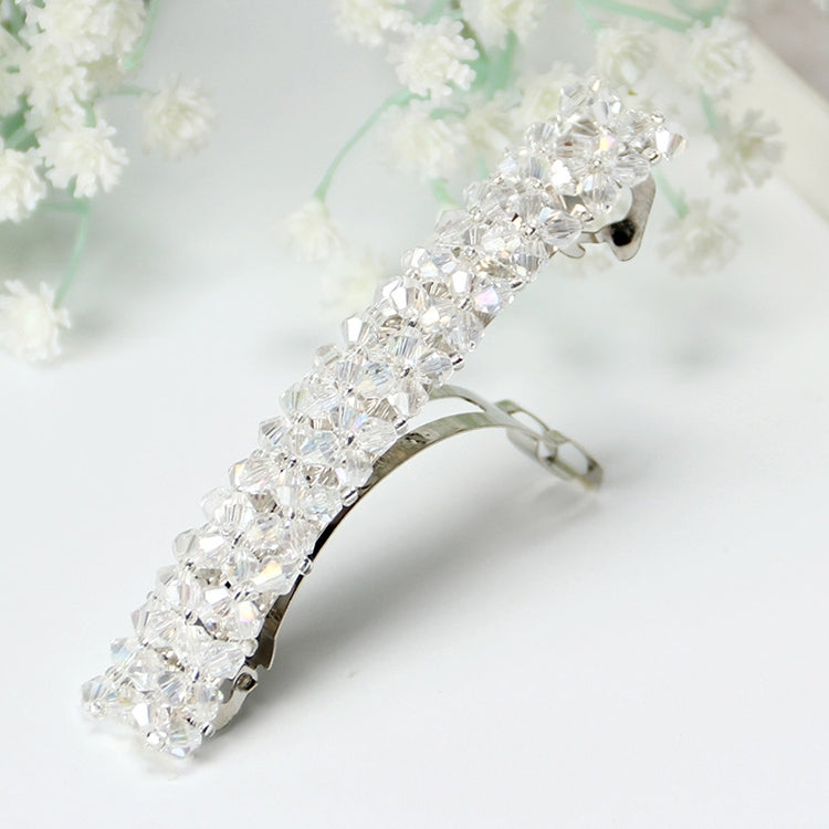 Rhinestone elastic hair clip with clear crystal-like stones, silver metal