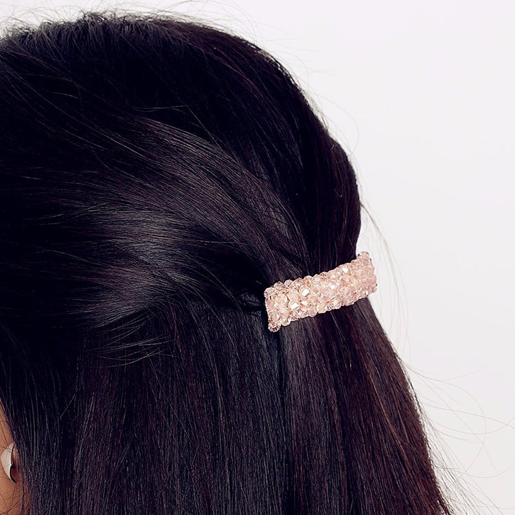 Girls rhinestone elastic hair clip, light pink crystal bar on dark hair