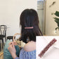 Girls rhinestone elastic hair clip, pink crystal bar on dark hair