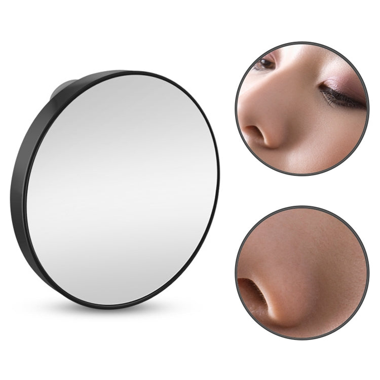 Black round suction cup makeup mirror with reflective lens and two magnified closeups