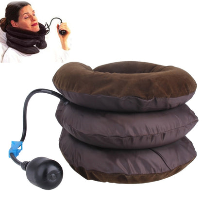 Brown inflatable cervical neck traction pillow with black pump bulb and blue valve