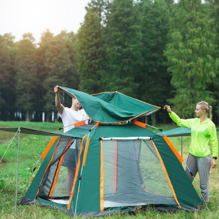 Dark green camping tent with orange trim, open doorway and mesh side panels