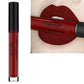 Matte liquid lipstick with deep red-burgundy shade, long-wearing lip color in a clear tube