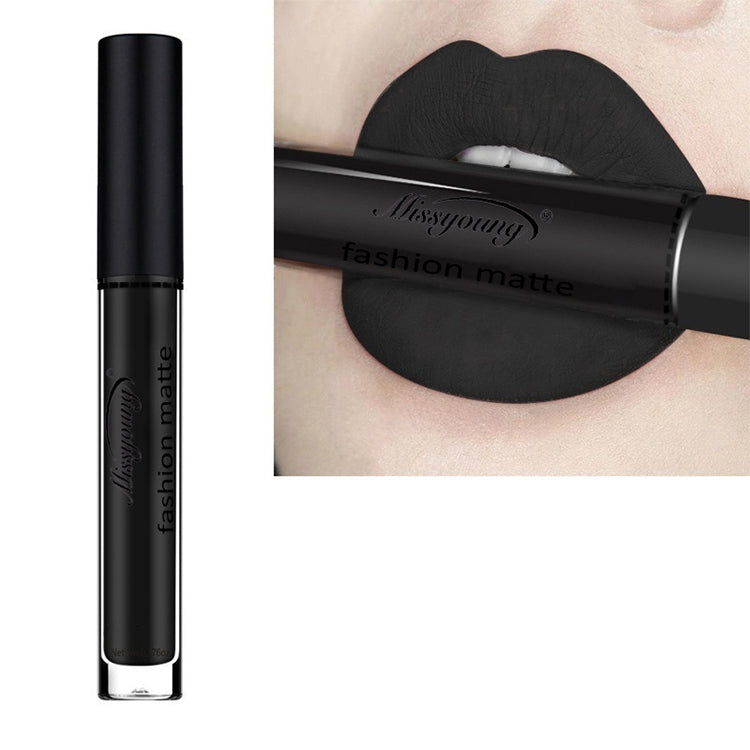 Matte liquid lipstick with black shade, long-wearing lip color in a clear tube