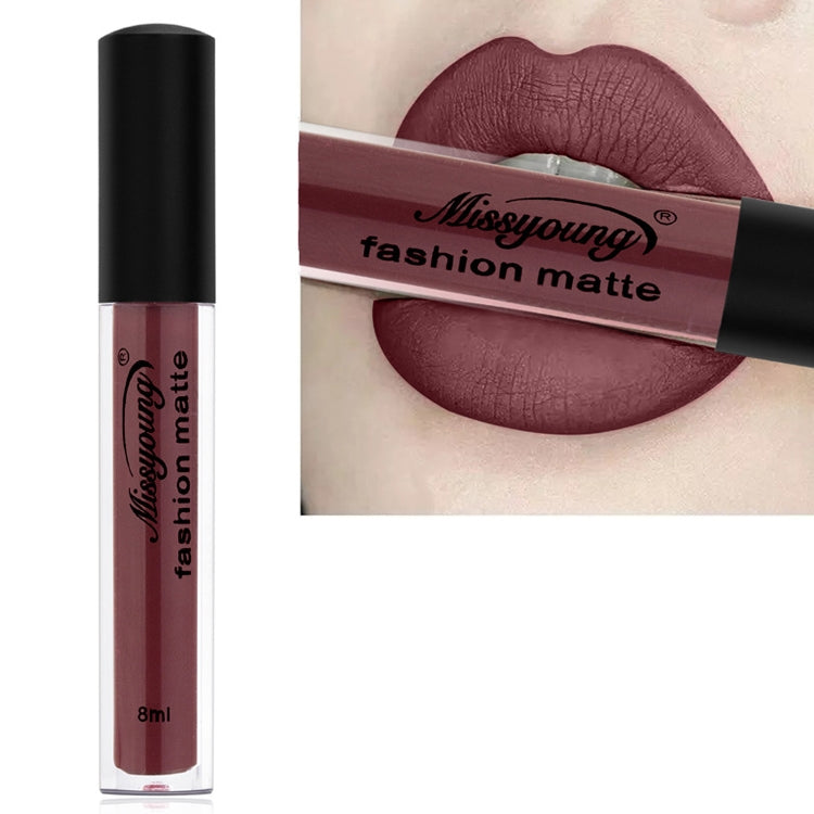 Matte liquid lipstick in clear tube with black cap, mauve-brown shade