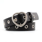 Black narrow leather belt with silver heart buckle and round grommet studs