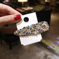 Sparkling rhinestone hair barrette with multicolor crystal shine and faux pearl details
