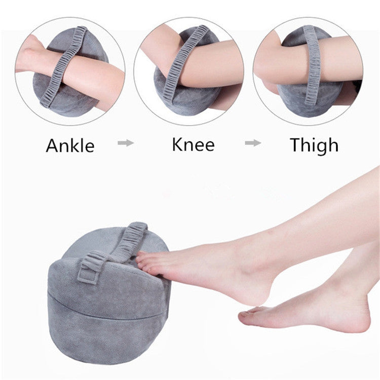 Light gray leg pillow cushion with strap, shown for ankle, knee, and thigh support
