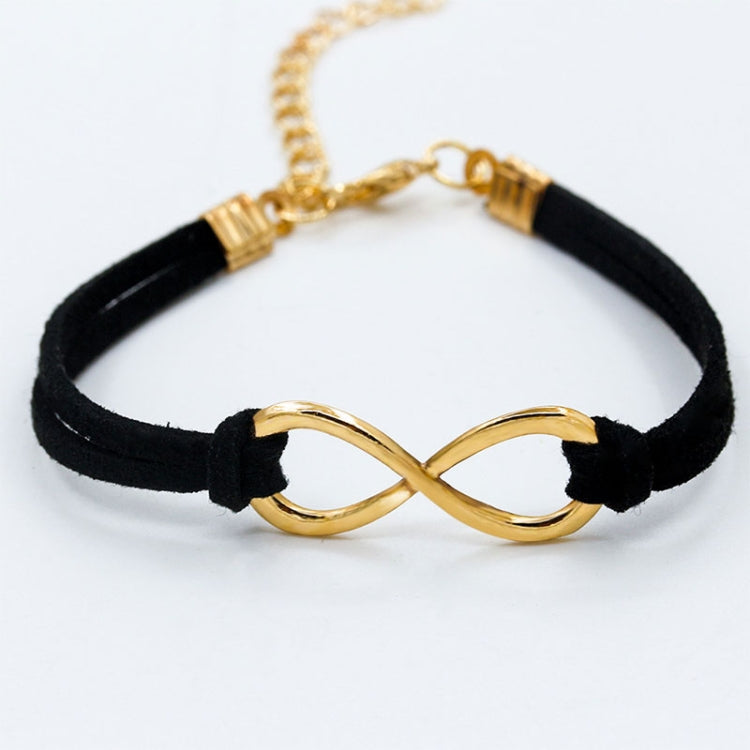 Black braided twine infinity bracelet with gold-tone metal infinity link and knots