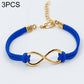 Blue twine infinity symbol bracelet with gold-tone metal infinity link and knots