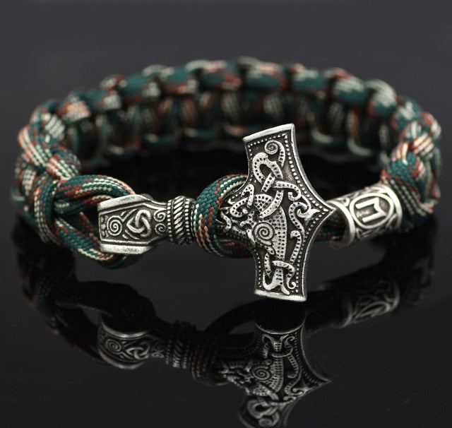 Braided rope bracelet with silver-tone Thor hammer charm and clasp, teal and brown