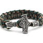 Braided rope bracelet with silver-tone Thor hammer pendant, teal, tan, and brown weave