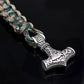 Braided rope bracelet with silver-tone Thor hammer charm and engraved metal cuff, teal