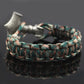 Braided rope bracelet with silver-tone Thor hammer charm and textured weave, teal and brown