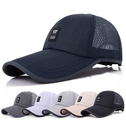 Breathable mesh baseball cap in navy with curved brim and textured mesh front.
