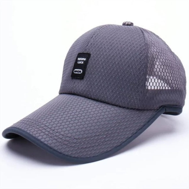 Breathable mesh baseball cap in gray with curved brim and side mesh panel.