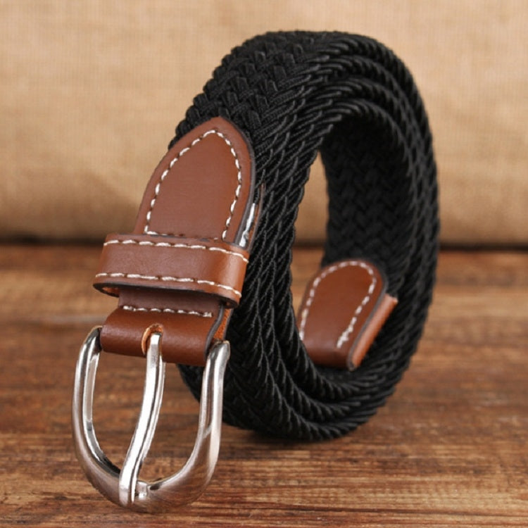 Narrow elastic canvas weave belt with black braid, brown leather keeper, silver double-prong buckle.
