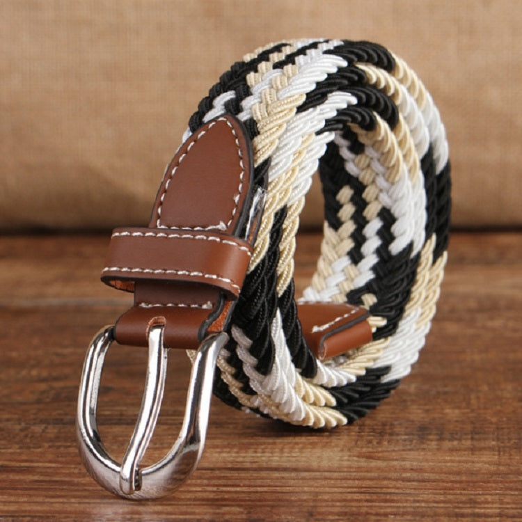 Narrow woven elastic belt with silver buckle, black-and-beige braided canvas, brown keeper.