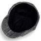 Black-and-white plaid octagonal cap with lined interior and short brim
