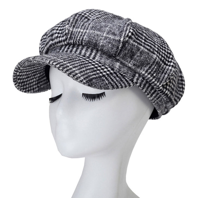 Gray plaid octagonal cap on headform with short brim and stitched crown